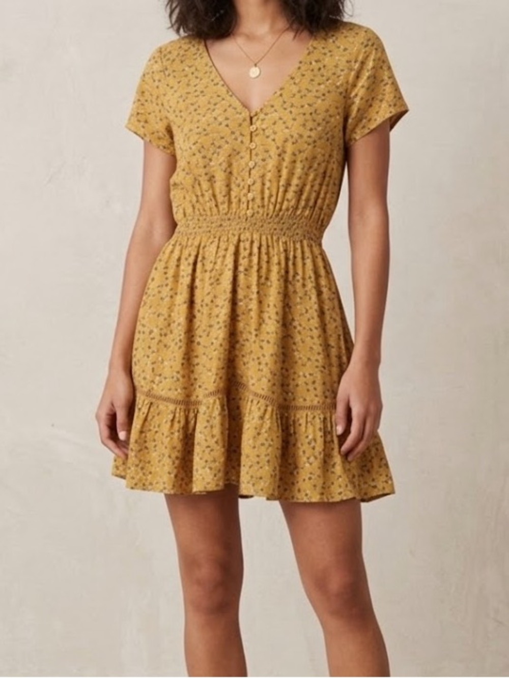 Anthropologie Mustard Floral Smocked V‑Neck Mini Dress